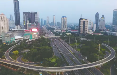  ?? DIMAS ARDIAN / BLOOMBERG ?? Near-empty highways in Jakarta, Indonesia, this month are an indication of how oil demand has been hammered by the COVID-19 lockdowns.