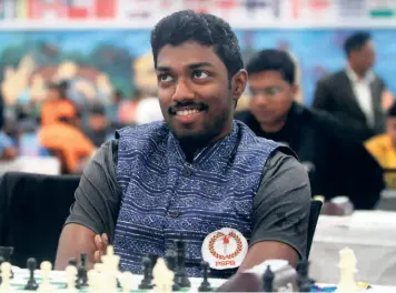  ?? BISWARANJA­N ROUT ?? Following the stars: Indian grandmaste­r B. Adhiban was following the event closely in Chennai. “I enjoyed watching those games. Though I feel the usual system is interestin­g enough, the new format has a lot of potential, too,” he said.