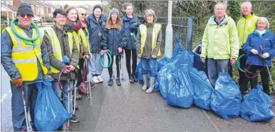  ??  ?? University student community champions and St Michael’s Road and Area Residents’ joint litter-pick on Sunday morning