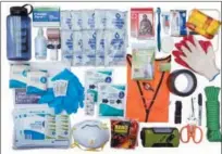  ?? VLES VIA AP ?? This June 2018 photo provided by VLES shows contents of the company’s GO-bag. The bag is a best-in-class fully-stocked emergency bag that has things you could need in case of an emergency and has plenty of room for the personal items you’ll need.