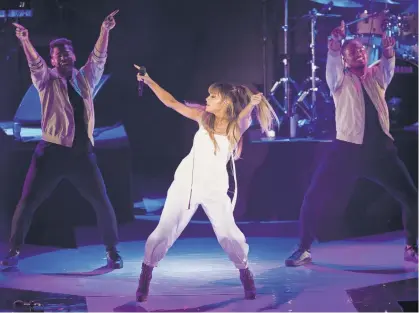  ?? ANDRES KUDACKI, AP ?? Ariana Grande says she’ll return to Manchester for a benefit concert to raise money for the victims of Monday’s bombing.