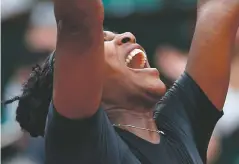  ?? THIBAULT CAMUS ASSOCIATED PRESS ?? Serena Williams celebrates winning her secondroun­d match of the French Open against Australia’s Ashleigh Barty in three sets, 3-6, 6-3, 6-4, on Thursday at Roland Garros stadium in Paris.