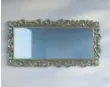  ??  ?? Make a statement with an antique mirror, or replica frame, which can feel like a work of art on your wall.