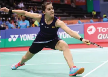  ??  ?? Spain’s Carolina Marin defeated Rituparna Das 21-13, 21-11 in their India Open Superserie­s second round match at the Siri Fort Complex courts in New Delhi on Thursday.