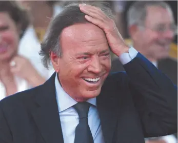  ?? AP FILE PHOTO ?? Julio Iglesias smiles during his star unveiling ceremony at the Walk of Fame in San Juan, Puerto Rico, in 2016.