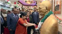  ?? Photo by Ryan Lim ?? Sushma Swaraj pays tribute in front of the statue of Mahatma Gandhi during her visit at the India Social and Cultural Centre in Abu Dhabi on Tuesday. —