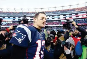  ?? ADAM GLANZMAN/GETTY IMAGES/AFP ?? Tom Brady of the New England Patriots reacts as he leaves the field after his team beat the Los Angeles Rams 26-10 on Sunday.