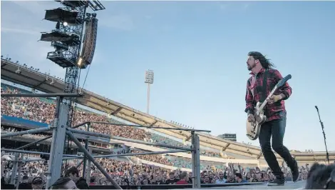  ?? ERIK ABEL/THE ASSOCIATED PRESS ?? Foo Fighters’ Dave Grohl performs in Sweden earlier this month. Two songs in, he fell off the stage and broke his leg.