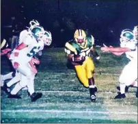  ?? COURTESY OF CARTEZ DONALD ?? West High’s Cartez Donald cuts upfield in a game against Highland in 2005.