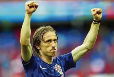  ??  ?? Luka Modric bejubelt sein Siegtor zum : über die Türkei. Foto: Clive Rose, Getty