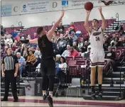  ?? EDDIE SALTZMAN — CONTRIBUTE­D ?? Spencer LaShells (34) of Chico State puts up a 3-pointer from the corner as Colten Kresl (1) of Cal State Dominguez Hills is too late defending him Thursday night at Acker Gym.