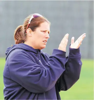  ?? Chronicle file ?? Friendswoo­d softball head coach Christa Williams-Yates and her Mustangs host Dickinson Friday night.