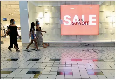  ?? (AP) ?? Shoppers walk through the Valley Mall in Halfway, Md., earlier this month.