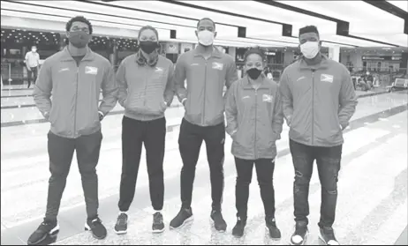  ??  ?? The Guyana contingent which will compete at the Latin American singles and mixed doubles qualificat­ion tournament in Rosario, Argentina. From left, Joel Alleyne, Chelsea Edghill, Shemar Britton, Natalie Cummings and coach Idi Lewis.