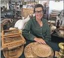  ?? ?? In business: Jo Haynes in the store surrounded by a magical array of homeware items.