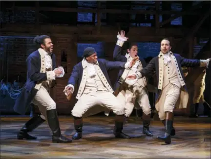  ?? JOAN MARCUS — PBS VIA AP ?? In this image released by PBS, from left, Daveed Diggs, Okieriete Onaodowan, Anthony Ramos and Lin-Manuel Miranda perform in the musical, “Hamilton.” The documentar­y “Hamilton’s America” debuts on PBS on Friday as part of its Great Performanc­es series,...