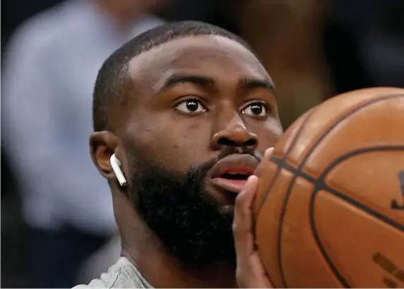  ?? STuART CAHILL / HERALd sTAFF FILE ?? WON’T BE SILENCED: Celtics guard Jaylen Brown is making it clear he doesn’t plan to stop talking about social justice as the NBA resumes its season.