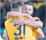  ??  ?? Craig Halkett celebrates with Declan Gallagher