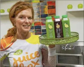  ?? NEWS-HERALD FILE ?? CLE Juice Box owner Erika Zakrajsek, shown in 2015, is also a marathon runner who fuels herself on the eatery’s juices.