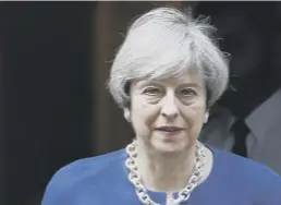  ??  ?? Brexit Minister David Davis in central London yesterday, top. Left, Theresa May and Labour Brexit secretary Keir Starmer, above