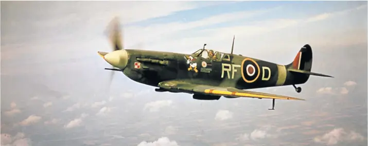  ?? Picture: HULTON ARCHIVE/GETTY IMAGES ?? HISTORIC MACHINE: A Supermarin­e Spitfire Mk.Vb, RF-D, flown by pilot Jan Zumbach (1915 - 1986) of the 303 Kosciuszko Polish Fighter Squadron of the Royal Air Force, World War 2, circa 1943. The aircraft bears Zumbach’s distinctiv­e Donald Duck symbol.