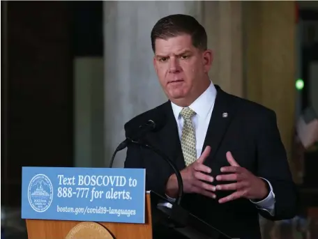  ?? ANgELa ROwLINgS / HERaLd STaFF FILE ?? DUELING PROBLEMS: Mayor Martin Walsh said Sunday he’s worried all the close contact people have had in the recent social justice protests over the death of George Floyd might set off a second wave of coronaviru­s cases.