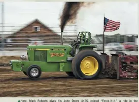  ??  ?? Here, Mark Roberts gives his John Deere 4455, coined “Force-n-it,” a ride in the 9,500-pound Pro Farm class. Unfortunat­ely, this would be the only group of tractors to hook to the sled before thundersto­rms brought things to a halt.