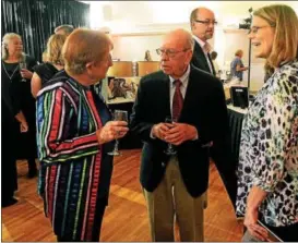  ??  ?? Ginny Ziegler, Jim Ziegler and Trish Smeddon chat before dinner at the Frederick Living 120th Star-Studded Event.