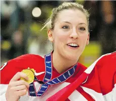  ?? PAUL CHIASSON/THE CANADIAN PRESS FILES ?? Meghan Agosta, seen with her gold medal at the 2012 Women’s World Hockey Championsh­ip, is the 2016 team’s alternate captain.