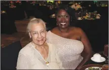  ?? (NWA Democrat-Gazette/Carin Schoppmeye­r) ?? Dr. Margaret Clark (left) and Myra McKenzie-Harris visit at the Celebrity Waiter benefit Oct. 22. Clark was named a “Difference Maker at the event for being “the first African American woman to receive tenure and have a residentia­l hall named in her honor at the University of Arkansas.”