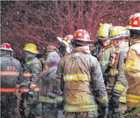  ?? ?? Hants County firefighte­rs battled a house fire in the middle of a snow storm in St. Croix Feb. 25.