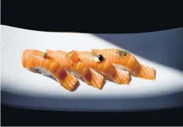  ?? ARLENE IBARRA ?? Salmon sushi at Lionfish.