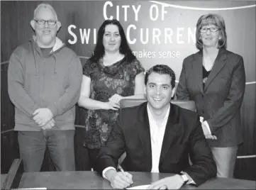  ??  ?? Swift Current SPCA Board Chairperso­n Graham Parsons, SPCA Board Fundraisin­g Chairperso­n Melanie Weinbender and SPCA Board Communicat­ions chairperso­n Susan McLaughlin were on hand as Swift Current Mayor Jerrod Schafer presented the SPCA with the first...