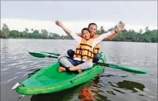  ??  ?? A photo of Sveng Socheata, known for her work in Angelina Jolie’s film is seen kayaking last year with her husband, whom she says threatened her life.