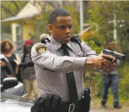  ?? Fred Norris / Fox ?? Deputy Joshua Beck (Mack Wilds) kills a white teenager in the pilot episode of “Shots Fired.”