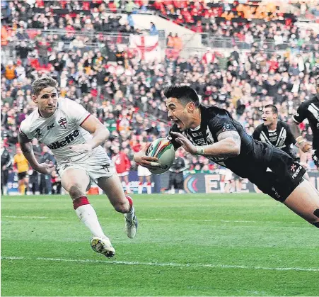  ??  ?? One of our great days — Shaun Johnson scores the winning try against England at Wembley Stadium in 2013.