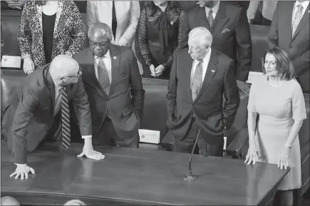  ?? PHOTOS BY J. SCOTT APPLEWHITE / AP ?? The House Democratic leadership, from left, Democratic Caucus Chairman Joe Crowley, D-N.Y., Assistant Minority Leader James Clyburn, D-S.C., Minority Whip Steny Hoyer, D-MD., and House Minority Leader Nancy Pelosi, D-calif., confer during a joint...