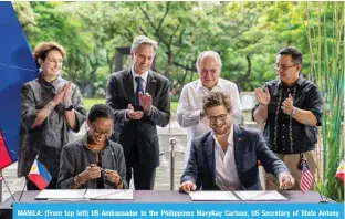  ?? ?? MANILA: (From top left) US Ambassador to the Philippine­s MaryKay Carlson, US Secretary of State Antony Blinken, Philippine Ambassador to the US Jose Manuel Romualdez and Philippine Department of Energy Undersecre­tary Felix William Fuentebell­a applaud as US Trade and Developmen­t Agency Director Enoh Ebong and Aboitiz Power Vice President of Renewables David Aboitiz participat­e in a USTDA Offshore Wind Grant signing at Ayala Triangle Gardens in Manila on August 6, 2022. —AFP