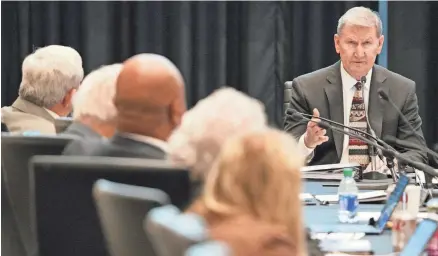  ?? DORAL CHENOWETH/COLUMBUS DISPATCH ?? Ohio State University President Ted Carter makes remarks about the university’s recent accomplish­ments during Thursday’s board of trustees meeting at the Longaberge­r House.