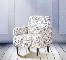  ??  ?? This Ayer Accent Chair, inspired by the French Bergere, is created using solid mahogany wood, with Uratex foam covered in toile de jouy printed fabric as its upholstery.