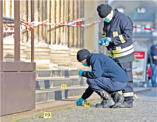  ??  ?? Police, left, search for clues outside Dresden’s Green Vault. Below left, some of the treasures targeted at the building including the Breast Star of the Polish White Eagle Order and an aigrette for the hair in the form of a crescent moon