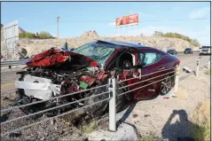  ?? (File Photo/AP/Pool/Nevada Highway Patrol) ?? A smashed up vehicle sits Sept. 10, 2018, on the shoulder of Interstate 80 in West Wendover, Nev. Nanette Marlow of Draper, a 75-year-old Utah woman, drove the wrong way on Interstate 80 for nearly 20 miles before crashing into an oncoming car, killing both drivers, injuring two others and shutting down part of the interstate near the Nevada-Utah line for several hours.
