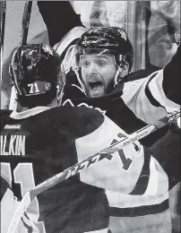  ?? USA Today Sports ?? TWO GOOD: Bryan Rust, right, celebrates with Evgeni Malkin during the second period Thursday.