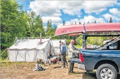  ?? SUBMITTED PHOTO ?? Trucks are great for mobile fishing camps, and getting a tailgate face wash.