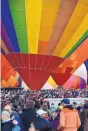  ?? JIM THOMPSON/JOURNAL ?? Though still more than four months away, staging of the 2020 Albuquerqu­e Internatio­nal Balloon Fiesta is not a lock. COVID-19 safety concerns about large gatherings, such as this one in 2018, could cause cancellati­on of the event.