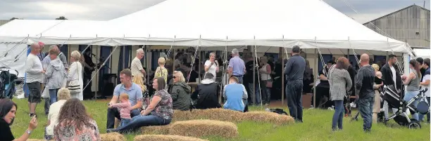  ??  ?? Pictured are visitors at the family day for employees both past and present to celebrate the 100th birthday of Kegworth engineerin­g company Slack and Parr Limited.