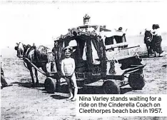  ??  ?? Nina Varley stands waiting for a ride on the Cinderella Coach on Cleethorpe­s beach back in 1957.