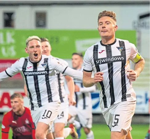  ??  ?? CAPTAIN GOALS: Euan Murray races away to celebrate after scoring Dunfermlin­e’s first of the night against Falkirk.