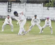  ??  ?? Sillkswort­h batsman Jonny Hall at the crease.