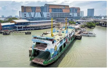  ??  ?? In limbo: The almost 100-year-old Penang ferry service badly needs an upgrade but funds for refurbishm­ent of the ageing ferries and terminals are not forthcomin­g.